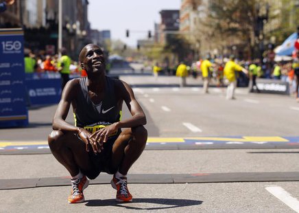Wesley Korir of Kenya smiles after crossing the finish line to win the men's division of the 116th Boston Marathon in Boston, Massachusetts Wesley Korir of Kenya smiles after crossing the finish line to win the men's division of the 116th Boston Marathon in Boston, Massachusetts