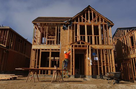 A construction worker is seen working while building single family homes in San Diego, California March 25, 2013. REUTERS/Mike Blake A construction worker is seen working while building single family homes in San Diego, California March 25, 2013. REUTERS/Mike Blake