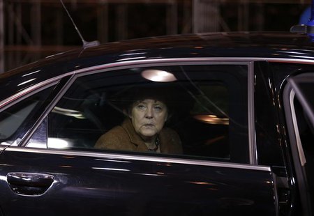 Germany's Chancellor Angela Merkel arrives at the EU council headquarters for an European Union leaders summit discussing the European Union Germany's Chancellor Angela Merkel arrives at the EU council headquarters for an European Union leaders summit discussing the European Union