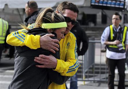 A woman is comforted by a man near a triage tent set up for the Boston Marathon after explosions went off at the 117th Boston Marathon in Boston, Massachusetts April 15, 2013. (Reuters) A woman is comforted by a man near a triage tent set up for the Boston Marathon after explosions went off at the 117th Boston Marathon in Boston, Massachusetts April 15, 2013. (Reuters)
