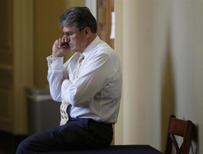 Senator Joe Manchin (D-WVA) takes a call outside a party policy luncheon on Capitol Hill in Washington April 9, 2013. REUTERS/Gary Cameron Senator Joe Manchin (D-WVA) takes a call outside a party policy luncheon on Capitol Hill in Washington April 9, 2013. REUTERS/Gary Cameron