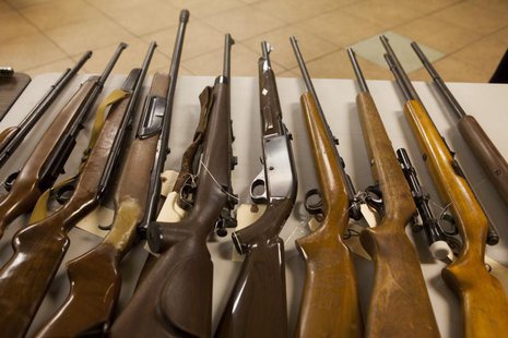 San Diego law enforcement officials show collected weapons during a gun buy-back December 21, 2012 in San Diego, California. REUTERS/Sam Hod San Diego law enforcement officials show collected weapons during a gun buy-back December 21, 2012 in San Diego, California. REUTERS/Sam Hod