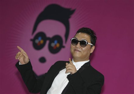 South Korean rapper Psy poses during a news conference before his concert in Seoul April 13, 2013. REUTERS/Lee Jae-Won South Korean rapper Psy poses during a news conference before his concert in Seoul April 13, 2013. REUTERS/Lee Jae-Won