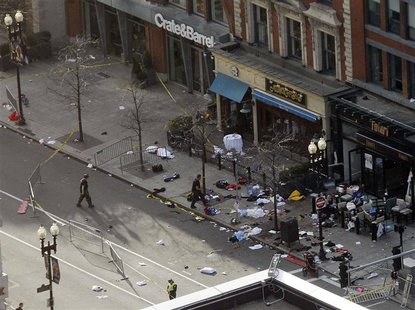 Debris is seen along Boylston Street after explosions went off at the 117th Boston Marathon in Boston, Massachusetts April 15, 2013. REUTERS Debris is seen along Boylston Street after explosions went off at the 117th Boston Marathon in Boston, Massachusetts April 15, 2013. REUTERS