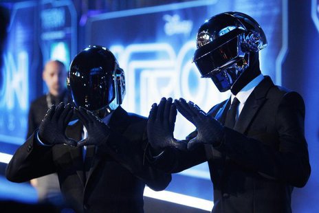 Musicians Thomas Banglater and Guy-Manuel de Homem-Christo of Daft Punk pose at the world premiere of the film "TRON: Legacy" in Hollywood, Musicians Thomas Banglater and Guy-Manuel de Homem-Christo of Daft Punk pose at the world premiere of the film "TRON: Legacy" in Hollywood,