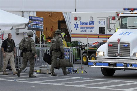 Agents from several federal agencies including the FBI and ATF arrive on scene after explosions near the finish line of the Boston Marathon Agents from several federal agencies including the FBI and ATF arrive on scene after explosions near the finish line of the Boston Marathon