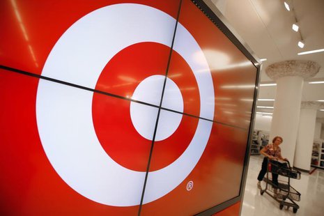 A vendor pushes a shopping cart through the new CityTarget store as it is getting stocked for the opening in downtown Chicago July 18, 2012. A vendor pushes a shopping cart through the new CityTarget store as it is getting stocked for the opening in downtown Chicago July 18, 2012.
