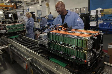 Ford Motor production workers assemble batteries for Ford electric and hybrid vehicles at the Ford Rawsonville Assembly Plant in Ypsilanti T Ford Motor production workers assemble batteries for Ford electric and hybrid vehicles at the Ford Rawsonville Assembly Plant in Ypsilanti T