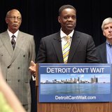 Lawyer Kevyn Orr (C) addresses the media, as Detroit Mayor Dave Bing (L) and Michigan Governor Rick Snyder listen, after Snyder announced Or Lawyer Kevyn Orr (C) addresses the media, as Detroit Mayor Dave Bing (L) and Michigan Governor Rick Snyder listen, after Snyder announced Or