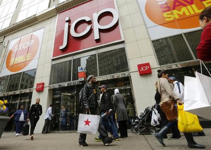 A man with a Macy's bag walks past the J.C. Penney's store in New York, April 11, 2013. REUTERS/Brendan McDermid A man with a Macy's bag walks past the J.C. Penney's store in New York, April 11, 2013. REUTERS/Brendan McDermid