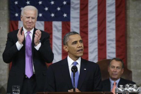 U.S. President Barack Obama (C), flanked by Vice President Joe Biden (L) and House Speaker John Boehner (R-OH), delivers his State of the Un U.S. President Barack Obama (C), flanked by Vice President Joe Biden (L) and House Speaker John Boehner (R-OH), delivers his State of the Un