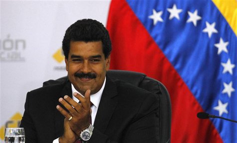 Venezuela's President-elect Nicolas Maduro smiles before he receives from the National Election Council a certificate confirming him as winn Venezuela's President-elect Nicolas Maduro smiles before he receives from the National Election Council a certificate confirming him as winn