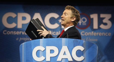Senator Rand Paul of Kentucky holds up binders, a reference to his recent 13-hour filibuster, as he speaks at the Conservative Political Act Senator Rand Paul of Kentucky holds up binders, a reference to his recent 13-hour filibuster, as he speaks at the Conservative Political Act