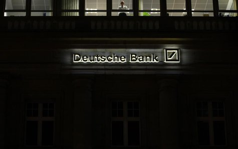 The logo of Germany's largest business bank, Deutsche Bank, is illuminated at the bank's original headquarters in Frankfurt January 31, 2012 The logo of Germany's largest business bank, Deutsche Bank, is illuminated at the bank's original headquarters in Frankfurt January 31, 2012