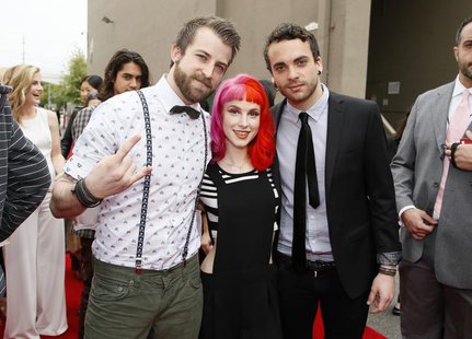 Jeremy Davis (L), Hayley Williams and Taylor York, of the band Paramore, arrive at the 2013 MTV Movie Awards in Culver City, California Apri Jeremy Davis (L), Hayley Williams and Taylor York, of the band Paramore, arrive at the 2013 MTV Movie Awards in Culver City, California Apri