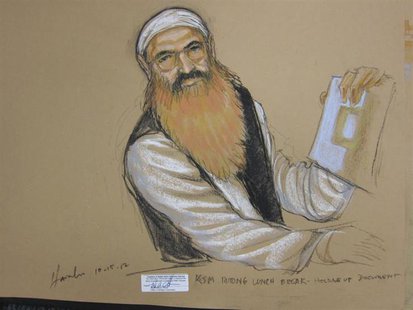Khalid Sheikh Mohammed holds up a piece of paper in this artist's sketch during a court recess at pre-trail hearing at the U.S. Naval Base G Khalid Sheikh Mohammed holds up a piece of paper in this artist's sketch during a court recess at pre-trail hearing at the U.S. Naval Base G