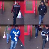 Suspects caught on video surveillance at Target in Bellevue on April 11th.  (Photo courtesy of Fox 11 WLUK-TV) 