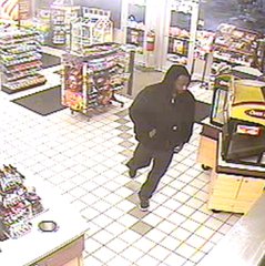 An armed robbery suspect is seen in surveillance footage in Emmett Township. An armed robbery suspect is seen in surveillance footage in Emmett Township.