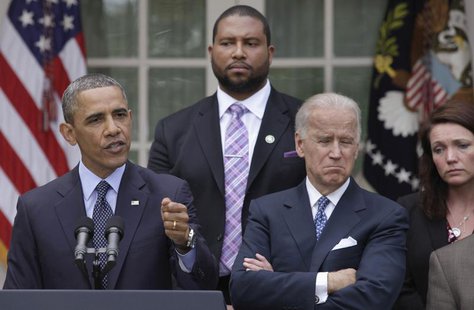 U.S. President Barack Obama (L) speaks alongside with Vice President Joe Biden and family members of Newtown victims on commonsense measures U.S. President Barack Obama (L) speaks alongside with Vice President Joe Biden and family members of Newtown victims on commonsense measures