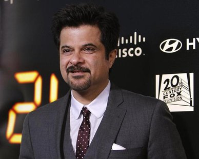 Cast member Anil Kapoor poses at the party for the television series finale of "24" in Los Angeles April 30, 2010. REUTERS/Mario Anzuoni Cast member Anil Kapoor poses at the party for the television series finale of "24" in Los Angeles April 30, 2010. REUTERS/Mario Anzuoni