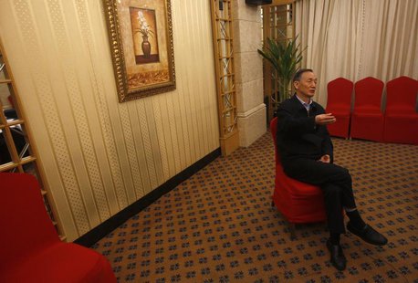 ZTE Chairman Hou Weigui gestures during an interview in Beijing April 18, 2013. ZTE Corp, China's second-largest telecoms equipment maker, h ZTE Chairman Hou Weigui gestures during an interview in Beijing April 18, 2013. ZTE Corp, China's second-largest telecoms equipment maker, h