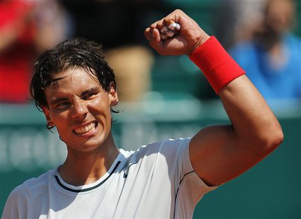 Rafael Nadal of Spain reacts after defeating Philipp Kohlschreiber of Germany during the Monte Carlo Masters in Monaco April 18, 2013. REUTE Rafael Nadal of Spain reacts after defeating Philipp Kohlschreiber of Germany during the Monte Carlo Masters in Monaco April 18, 2013. REUTE