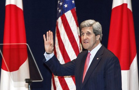 U.S. Secretary of State John Kerry waves to the crowd as he enters the auditorium to deliver a policy speech at the Tokyo Institute of Techn U.S. Secretary of State John Kerry waves to the crowd as he enters the auditorium to deliver a policy speech at the Tokyo Institute of Techn