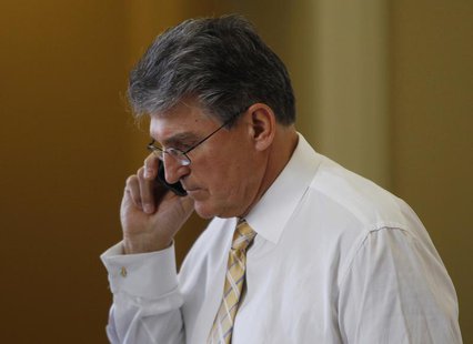Senator Joe Manchin (D-WVA) takes a call outside a party policy luncheon on Capitol Hill in Washington April 9, 2013. REUTERS/Gary Cameron Senator Joe Manchin (D-WVA) takes a call outside a party policy luncheon on Capitol Hill in Washington April 9, 2013. REUTERS/Gary Cameron