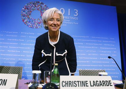 Christine Lagarde, Managing Director of the International Monetary Fund (IMF), takes her seat as she arrives for her opening news conference Christine Lagarde, Managing Director of the International Monetary Fund (IMF), takes her seat as she arrives for her opening news conference