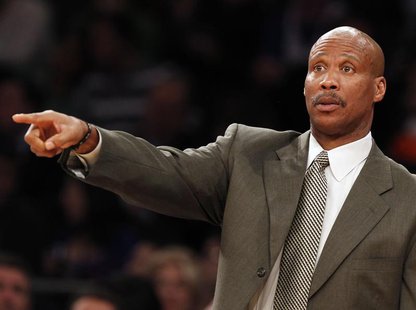 Cleveland Cavaliers head coach Byron Scott gives instructions to his team during the fourth quarter of their NBA basketball game against the Cleveland Cavaliers head coach Byron Scott gives instructions to his team during the fourth quarter of their NBA basketball game against the