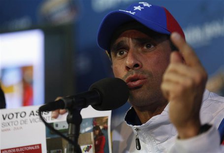 Venezuela's opposition leader Henrique Capriles speaks during a news conference in Caracas April 16, 2013. REUTERS/Tomas Bravo Venezuela's opposition leader Henrique Capriles speaks during a news conference in Caracas April 16, 2013. REUTERS/Tomas Bravo