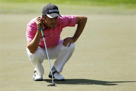 Felipe Aguilar of Chile lines up his shot on the second green during the fourth and final round of the Dubai Desert Classic at the Emirates Felipe Aguilar of Chile lines up his shot on the second green during the fourth and final round of the Dubai Desert Classic at the Emirates
