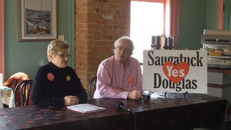Bobby Gaunt (L) and Travis Randolph (R) discuss their efforts to consolidate Saugatuck & Douglas during a press briefing on Apr. 1, 2013 Bobby Gaunt (L) and Travis Randolph (R) discuss their efforts to consolidate Saugatuck & Douglas during a press briefing on Apr. 1, 2013