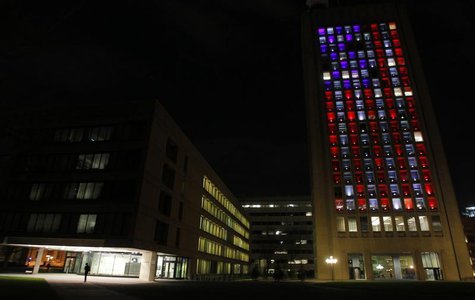 A building at the Massachusetts Institute of Technology is lit up in red, white and blue as a tribute to those who were killed or injured in A building at the Massachusetts Institute of Technology is lit up in red, white and blue as a tribute to those who were killed or injured in