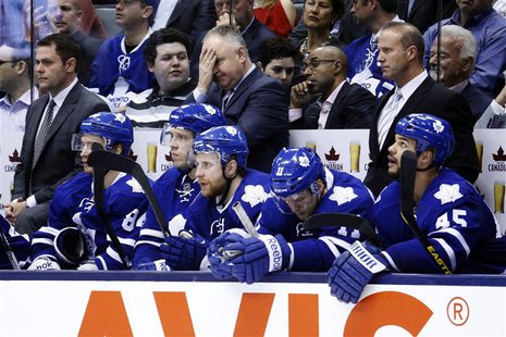 Toronto Maple Leafs head coach Randy Carlyle gestures as his team plays the New York Islanders during the third period of their NHL hockey g Toronto Maple Leafs head coach Randy Carlyle gestures as his team plays the New York Islanders during the third period of their NHL hockey g