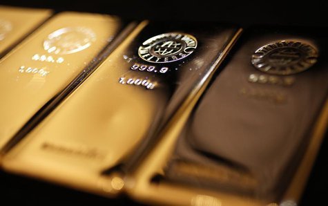 Gold bars are displayed at the Ginza Tanaka store in Tokyo April 18, 2013. REUTERS/Yuya Shino Gold bars are displayed at the Ginza Tanaka store in Tokyo April 18, 2013. REUTERS/Yuya Shino