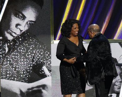 Oprah Winfrey speaks with Quincy Jones after his speech at the 2013 Rock and Roll Hall of Fame induction ceremony in Los Angeles April 18, 2 Oprah Winfrey speaks with Quincy Jones after his speech at the 2013 Rock and Roll Hall of Fame induction ceremony in Los Angeles April 18, 2
