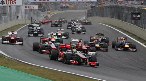 McLaren Formula One driver Lewis Hamilton of Britain (FRONT) drives ahead of the pack at the start of the Brazilian F1 Grand Prix at Interla McLaren Formula One driver Lewis Hamilton of Britain (FRONT) drives ahead of the pack at the start of the Brazilian F1 Grand Prix at Interla