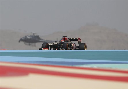 Lotus Formula One driver Kimi Raikkonen of Finland drives during the second practice session of the Bahrain F1 Grand Prix at the Sakhir circ Lotus Formula One driver Kimi Raikkonen of Finland drives during the second practice session of the Bahrain F1 Grand Prix at the Sakhir circ