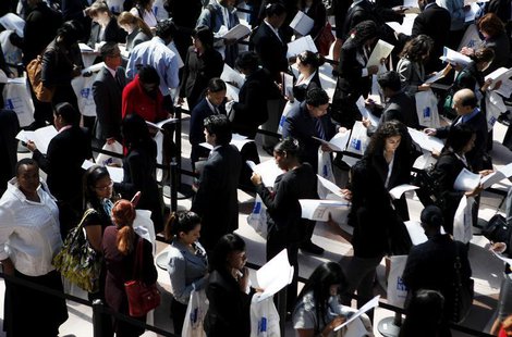 People wait in line to enter the City University of New York (CUNY) Big Apple job fair in New York, April 23, 2010. REUTERS/Shannon Stapleto People wait in line to enter the City University of New York (CUNY) Big Apple job fair in New York, April 23, 2010. REUTERS/Shannon Stapleto