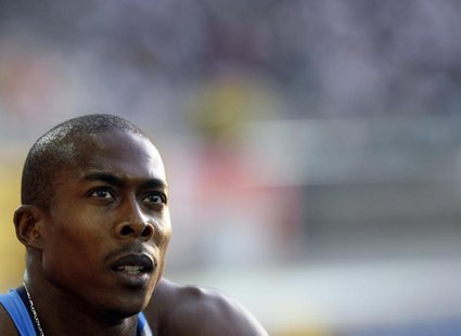 Shawn Crawford of the U.S. checks the scoreboard after the men's 200 meters semi-final during the world athletics championships at the Olymp Shawn Crawford of the U.S. checks the scoreboard after the men's 200 meters semi-final during the world athletics championships at the Olymp