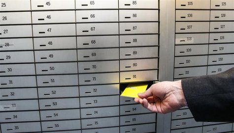Safe deposit boxes are pictured in a bank in the western Austrian city of Hall in Tirol April 8, 2013. REUTERS/ Dominic Ebenbichler Safe deposit boxes are pictured in a bank in the western Austrian city of Hall in Tirol April 8, 2013. REUTERS/ Dominic Ebenbichler