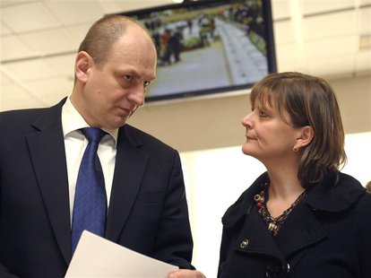 Former Czech Republic Agriculture Minister Petr Gandalovic (L) talks with his Belgium's counterpart Sabine Laruelle (R) at the start of a Eu Former Czech Republic Agriculture Minister Petr Gandalovic (L) talks with his Belgium's counterpart Sabine Laruelle (R) at the start of a Eu