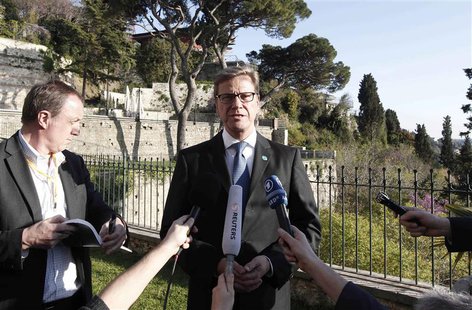 Germany's Foreign Minister Guido Westerwelle (C) speaks with the media before a meeting with the Friends of Syria group in Istanbul April 20 Germany's Foreign Minister Guido Westerwelle (C) speaks with the media before a meeting with the Friends of Syria group in Istanbul April 20