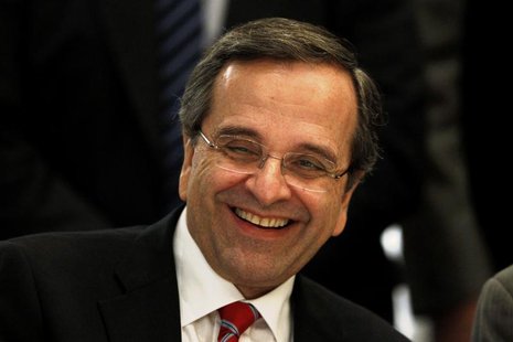 Greek Prime Minister Antonis Samaras smiles during the Economist Conference on "Overcoming Stagnation: Reigniting Greece's Potential", in At Greek Prime Minister Antonis Samaras smiles during the Economist Conference on "Overcoming Stagnation: Reigniting Greece's Potential", in At