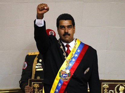 Venezuela's President Nicolas Maduro gestures after being sworn into office in Caracas April 19, 2013. REUTERS/Carlos Garcia Rawlins Venezuela's President Nicolas Maduro gestures after being sworn into office in Caracas April 19, 2013. REUTERS/Carlos Garcia Rawlins