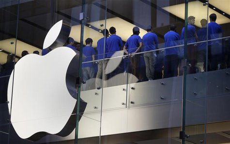 Staff at an Apple store hold a meeting before they open their doors on the day the iPhone 5 went on sale to the public, in central Sydney Se Staff at an Apple store hold a meeting before they open their doors on the day the iPhone 5 went on sale to the public, in central Sydney Se