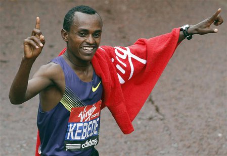 Olympic bronze medallist Tsegaye Kebede of Ethiopia celebrates after winning his seventh successive London men's marathon title in London Ap Olympic bronze medallist Tsegaye Kebede of Ethiopia celebrates after winning his seventh successive London men's marathon title in London Ap