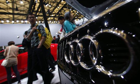 People look at Audi cars during the 15th Shanghai International Automobile Industry Exhibition in Shanghai April 21, 2013. REUTERS/Carlos Ba People look at Audi cars during the 15th Shanghai International Automobile Industry Exhibition in Shanghai April 21, 2013. REUTERS/Carlos Ba