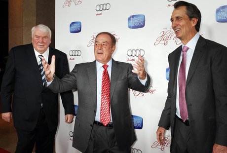 Sportscaster Al Michaels (C) Hall of Fame inductee poses with fellow sportscasters John Madden (L) and Cris Collinsworth at the Academy of T Sportscaster Al Michaels (C) Hall of Fame inductee poses with fellow sportscasters John Madden (L) and Cris Collinsworth at the Academy of T